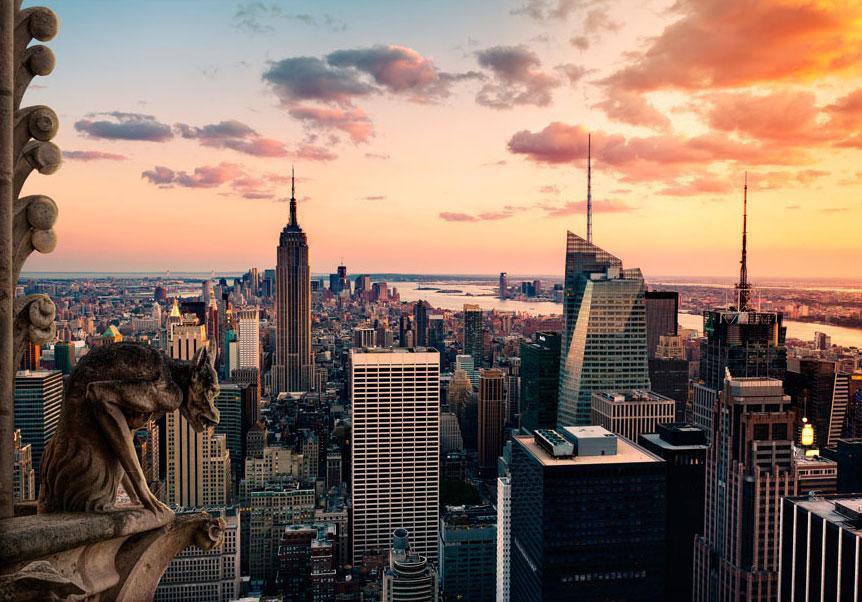 Selbstklebende Fototapete - New York: Die Wolkenkratzer und der Sonnenuntergang